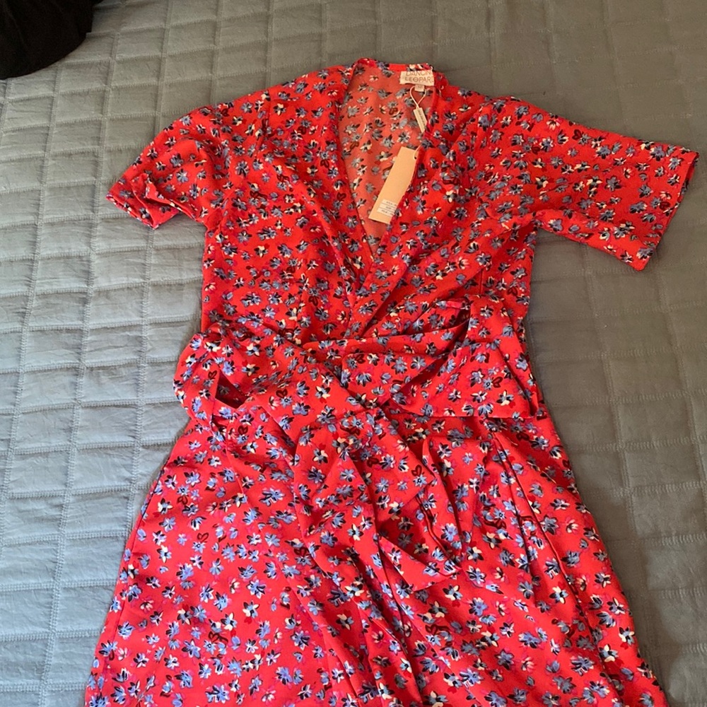 Brand new never worn dancing leopard jumpsuit. SO flattering